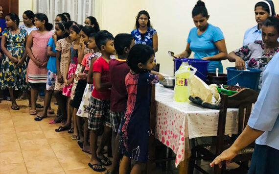 Giving Dinner to the Children of Don Severino Fabriani Hearing Impaired School in Waikkala